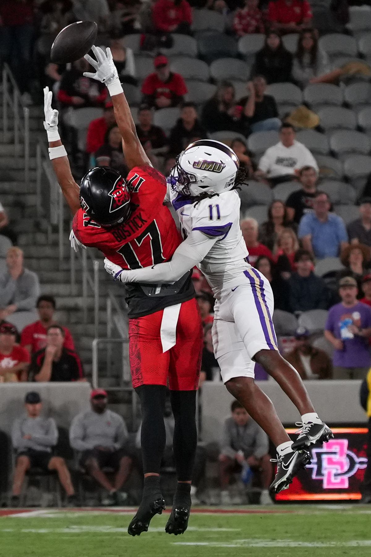 San Diego State University wide receiver Jacob Bostick (17) attempts to catch the ball during an NCAA football game against James Madison University, Saturday September 19, 2026 in San Diego, California.