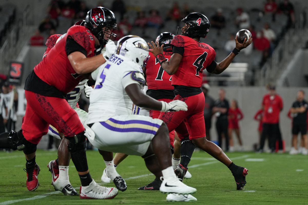 San Diego State University quarterback Jayden Denegal (4) throws the ball during an NCAA football game against James Madison University, Saturday September 19, 2026 in San Diego, California.