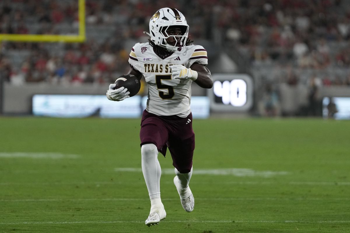 Texas State University running back Jaylen Jenkins (5) runs up the field during an NCAA football game against San Diego State University, Saturday October 03, 2026 in San Diego, California. Texas State University running back Jaylen Jenkins (5) runs up the field during an NCAA football game against San Diego State University, Saturday October 03, 2026 in San Diego, California.