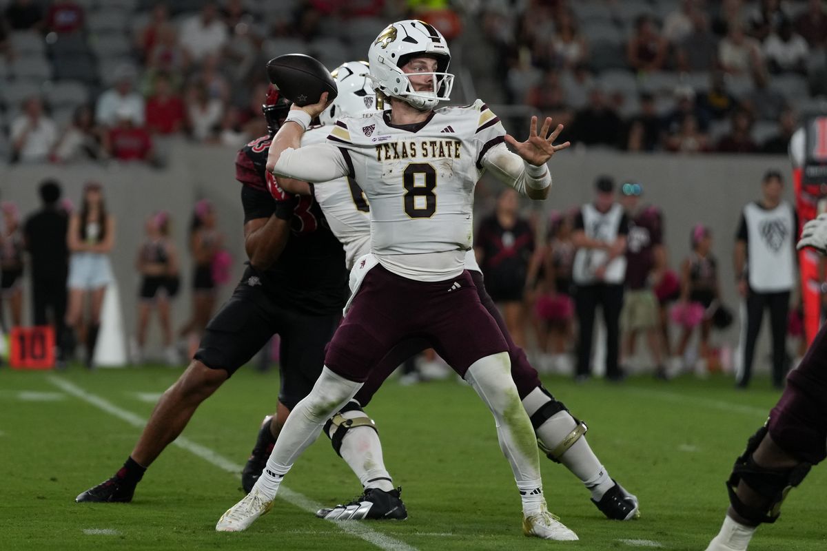 Texas State University quarterback Brad Jackson (8) throws the ball during an NCAA football game against San Diego State University, Saturday October 03, 2026 in San Diego, California. Texas State University quarterback Brad Jackson (8) throws the ball during an NCAA football game against San Diego State University, Saturday October 03, 2026 in San Diego, California.