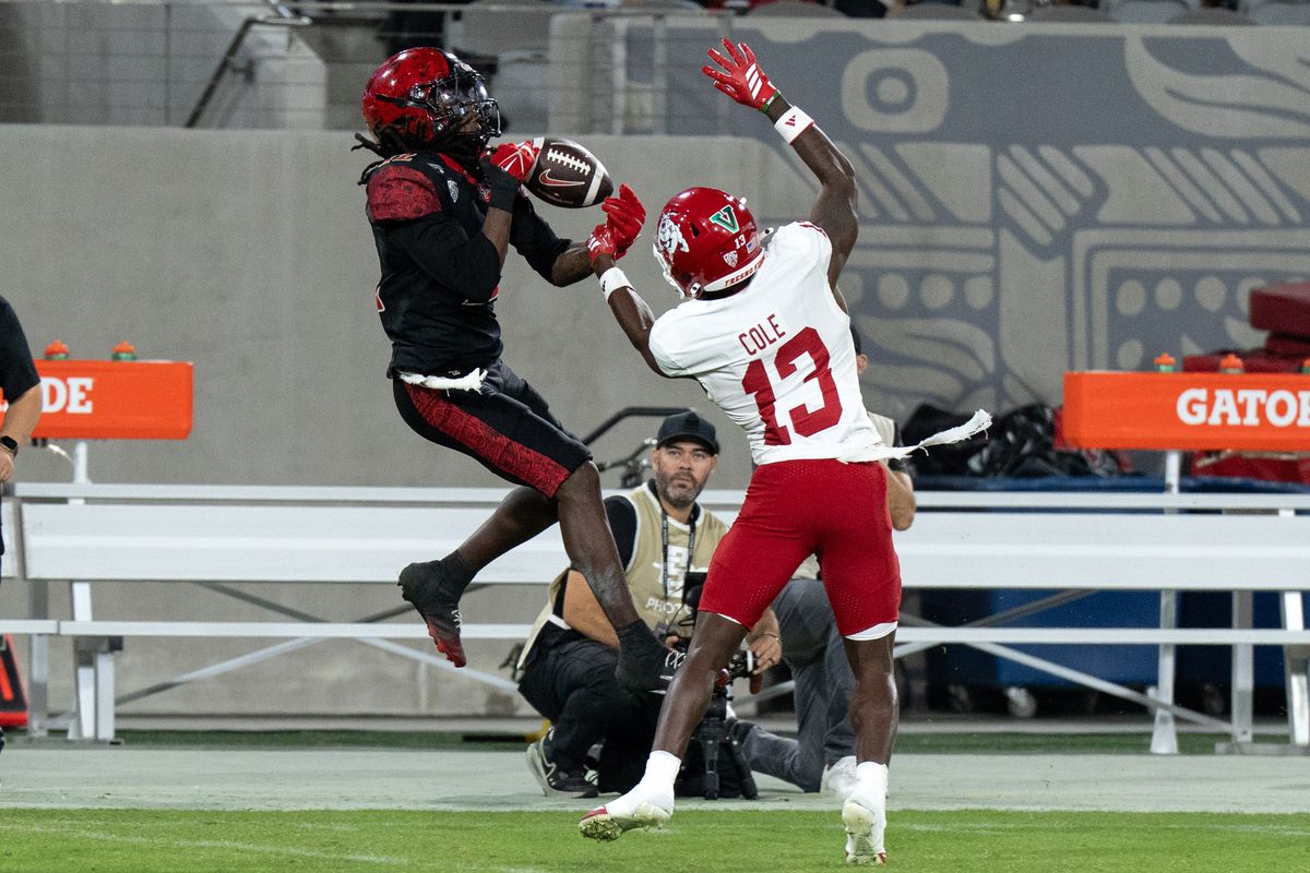 San Diego State University wide receiver Jaylon Hawkins (12) drops a pass during a PAC-12 football game against Fresno State, Saturday October 17, 2026 in San Diego, California. San Diego State University wide receiver Jaylon Hawkins (12) drops a pass during a PAC-12 football game against Fresno State, Saturday October 17, 2026 in San Diego, California.