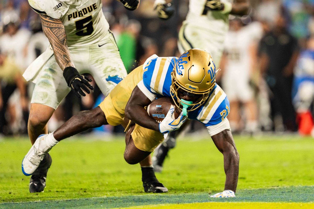 UCLA Bruins RB Jaivian Thomas (21) completes the touchdown during a NCAA football game against Purdue at Rose Bowl Stadium on September 19th, 2026 in Pasadena, California. UCLA Bruins RB Jaivian Thomas (21) completes the touchdown during a NCAA football game against Purdue at Rose Bowl Stadium on September 19th, 2026 in Pasadena, California.