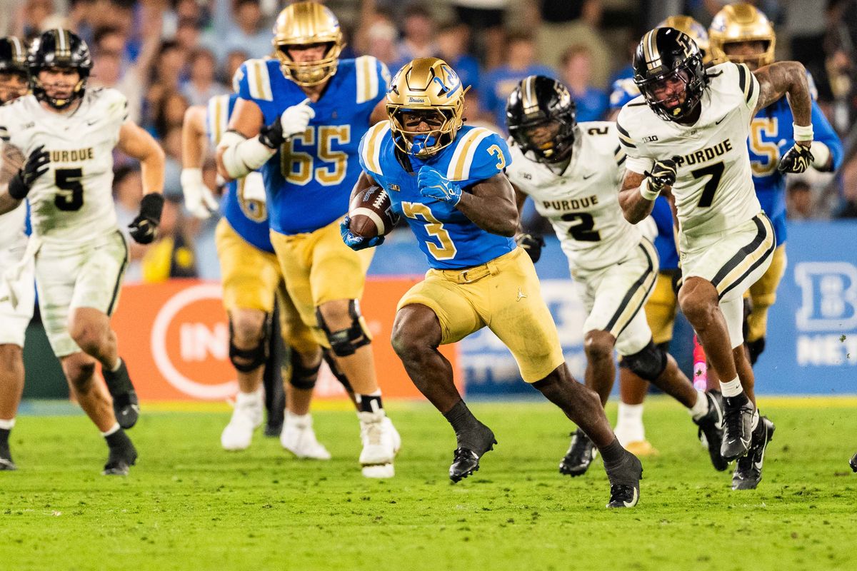 UCLA Bruins RB Wayne Knight (3) looking to score during a NCAA football game against Purdue at Rose Bowl Stadium on September 19th, 2026 in Pasadena, California. UCLA Bruins RB Wayne Knight (3) looking to score during a NCAA football game against Purdue at Rose Bowl Stadium on September 19th, 2026 in Pasadena, California.