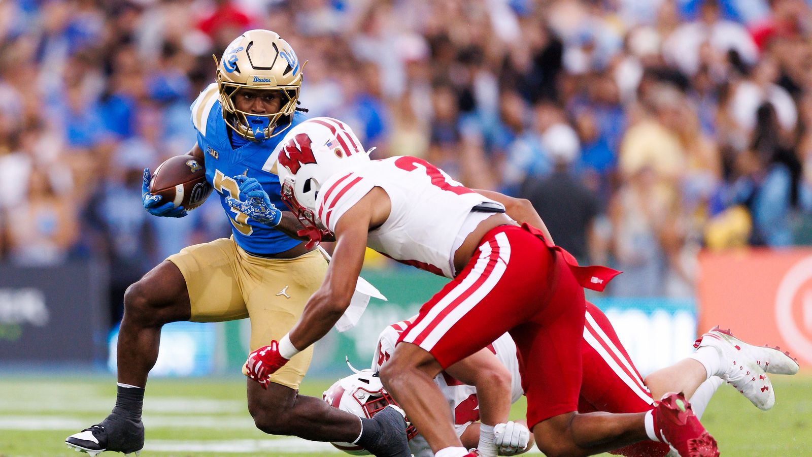 Wayne Knight #3 of the UCLA Bruins runs with the ball during the game against Wisconsin Badgers at Rose Bowl Stadium on October 17, 2026 in Pasadena, California. Wayne Knight #3 of the UCLA Bruins runs with the ball during the game against Wisconsin Badgers at Rose Bowl Stadium on October 17, 2026 in Pasadena, California.