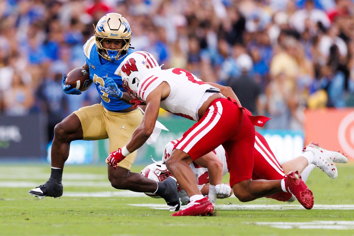Wayne Knight #3 of the UCLA Bruins runs with the ball during the game against Wisconsin Badgers at Rose Bowl Stadium on October 17, 2026 in Pasadena, California. Wayne Knight #3 of the UCLA Bruins runs with the ball during the game against Wisconsin Badgers at Rose Bowl Stadium on October 17, 2026 in Pasadena, California.