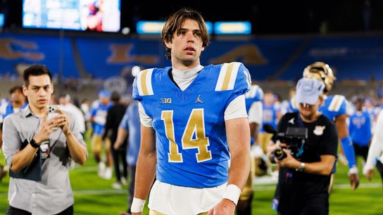 Ty Dieffenbach rises to the occasion to keep the Bruins unbeaten taken at Rose Bowl (UCLA). Photo by Ric Tapia - The Sporting Tribune
