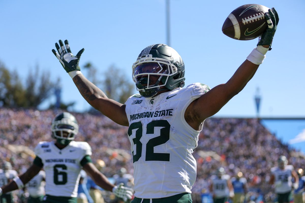 Kenneth Williams #32 of the Michigan State Spartans celebrates a touchdown run during the game against the UCLA Bruins at Rose Bowl Stadium on October 24, 2026 in Pasadena, California. Kenneth Williams #32 of the Michigan State Spartans celebrates a touchdown run during the game against the UCLA Bruins at Rose Bowl Stadium on October 24, 2026 in Pasadena, California.