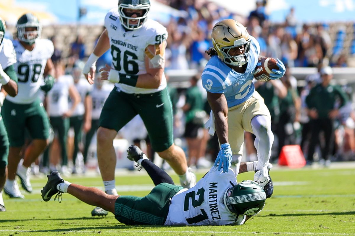 Wayne Knight #3 of the UCLA Bruins runs with the football during the game against the Michigan State Spartans at Rose Bowl Stadium on October 24, 2026 in Pasadena, California. Wayne Knight #3 of the UCLA Bruins runs with the football during the game against the Michigan State Spartans at Rose Bowl Stadium on October 24, 2026 in Pasadena, California.