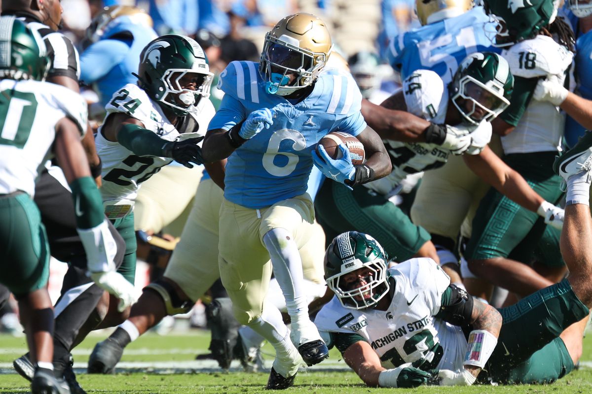 Anthony Woods #6 of the UCLA Bruins runs with the football during the game against the Michigan State Spartans at Rose Bowl Stadium on October 24, 2026 in Pasadena, California. Anthony Woods #6 of the UCLA Bruins runs with the football during the game against the Michigan State Spartans at Rose Bowl Stadium on October 24, 2026 in Pasadena, California.