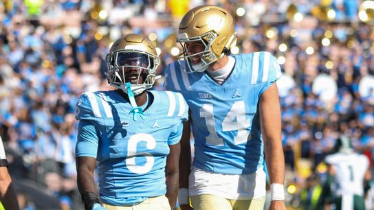 Ty Dieffenbach #14 and Anthony Woods #6 of the UCLA Bruins celebrate a touchdown during the game against the Michigan State Spartans at Rose Bowl Stadium on October 24, 2026 in Pasadena, California. Ty Dieffenbach #14 and Anthony Woods #6 of the UCLA Bruins celebrate a touchdown during the game against the Michigan State Spartans at Rose Bowl Stadium on October 24, 2026 in Pasadena, California.
