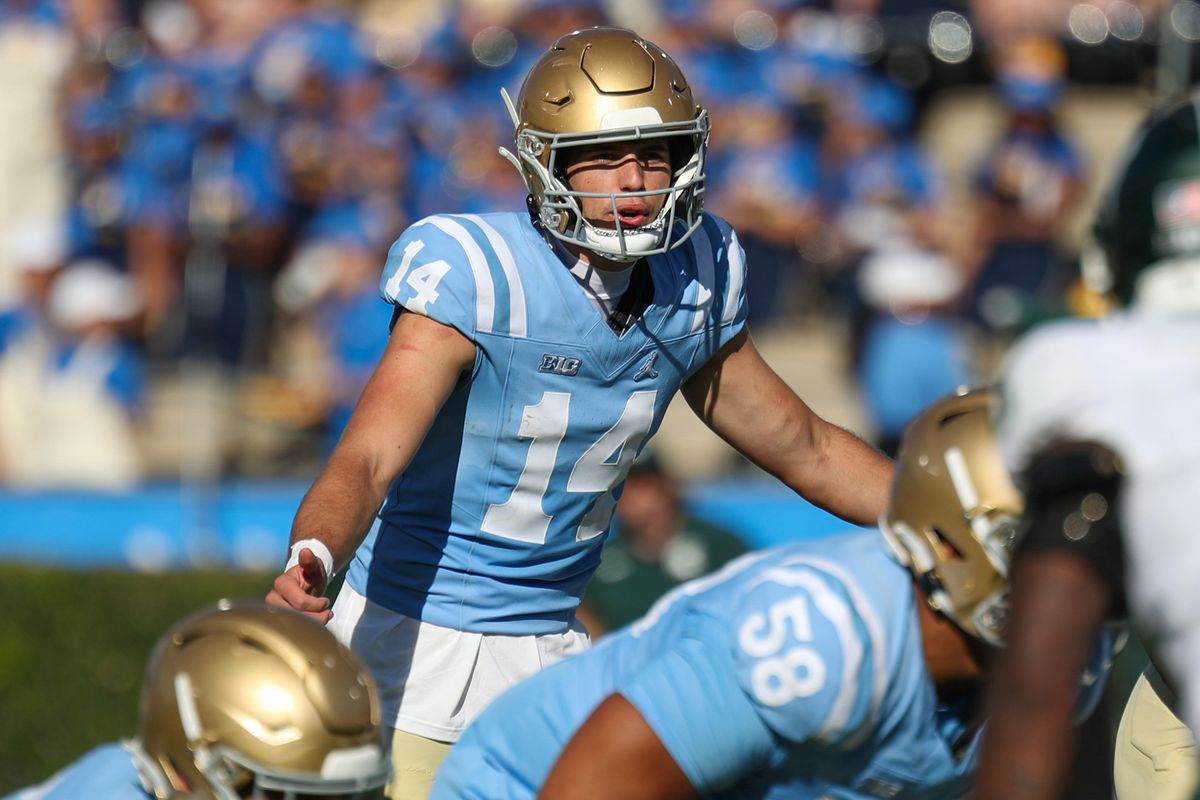 Ty Dieffenbach #14 of the UCLA Bruins calls signals at the line of scrimmage during the game against the Michigan State Spartans at Rose Bowl Stadium on October 24, 2026 in Pasadena, California. Ty Dieffenbach #14 of the UCLA Bruins calls signals at the line of scrimmage during the game against the Michigan State Spartans at Rose Bowl Stadium on October 24, 2026 in Pasadena, California.