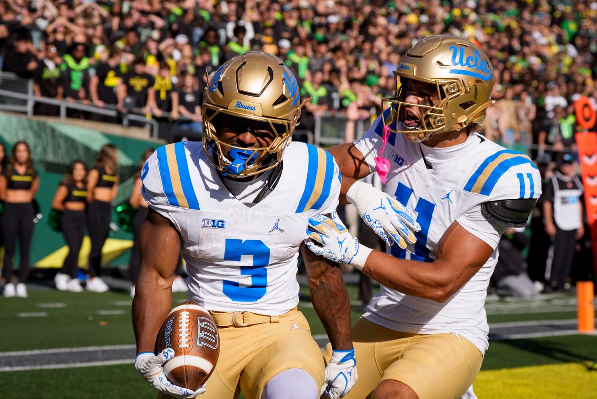 UCLA running back Wayne Knight, left, and wide receiver Landon Ellis celebrate a touchdown by Knight as the Oregon Ducks host the UCLA Bruins on Oct. 10, 2026, at Autzen Stadium in Eugene, Oregon. UCLA running back Wayne Knight, left, and wide receiver Landon Ellis celebrate a touchdown by Knight as the Oregon Ducks host the UCLA Bruins on Oct. 10, 2026, at Autzen Stadium in Eugene, Oregon.