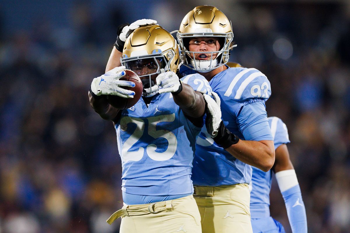 T.J. Harden #25 of the UCLA Bruins celebrates during the first half game against Iowa Hawkeyes at Rose Bowl Stadium on November 8, 2024 in Pasadena, California. 