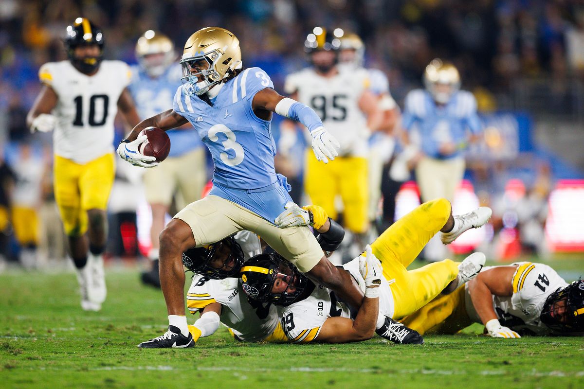 Kwazi Gilmer #3 of the UCLA Bruins runs after the catch during the second half game against Iowa Hawkeyes at Rose Bowl Stadium on November 8, 2024 in Pasadena, California. 