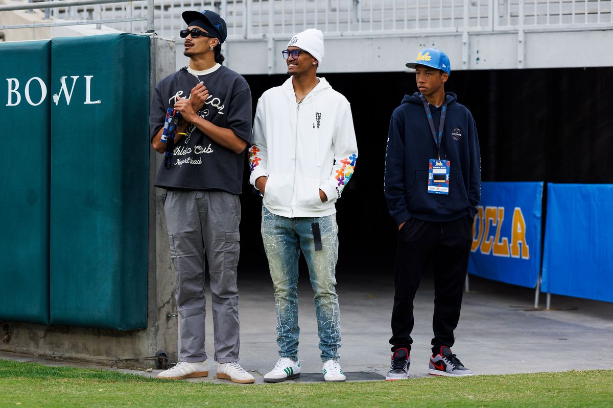 Nico Iamaleava, Madden Iamaleava and Jake Iamaleava on the sideline during the UCLA Football Spring Showcase at Rose Bowl Stadium on May 3, 2025 in Pasadena, California. 