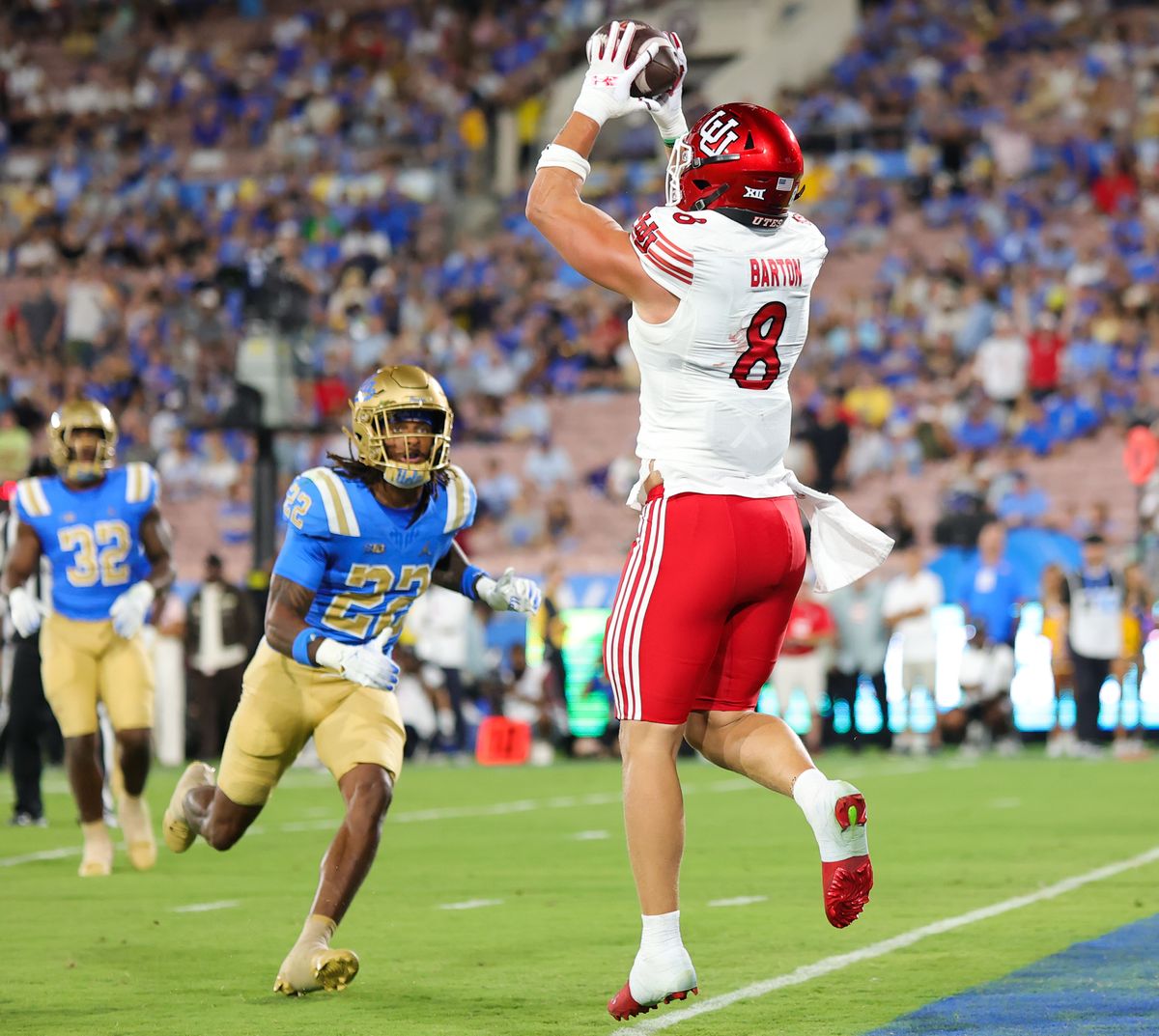 #8 Mana Carvahlo of the Utah Utes catches a touchdown pass during an NCAA football game against UCLA, Saturday August 30, 2025 in Pasadena, CA. #8 Mana Carvahlo of the Utah Utes catches a touchdown pass during an NCAA football game against UCLA, Saturday August 30, 2025 in Pasadena, CA.