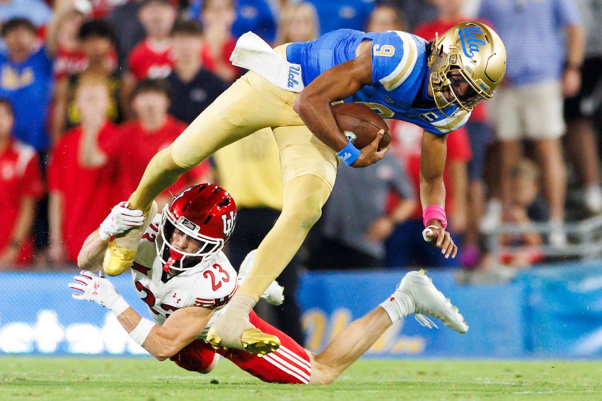 Jackson Bennee #23 of the Utah Utes tackles Nico Iamaleava #9 of the UCLA Bruins during the first half at Rose Bowl Stadium on August 30, 2025 in Pasadena, California. Jackson Bennee #23 of the Utah Utes tackles Nico Iamaleava #9 of the UCLA Bruins during the first half at Rose Bowl Stadium on August 30, 2025 in Pasadena, California.