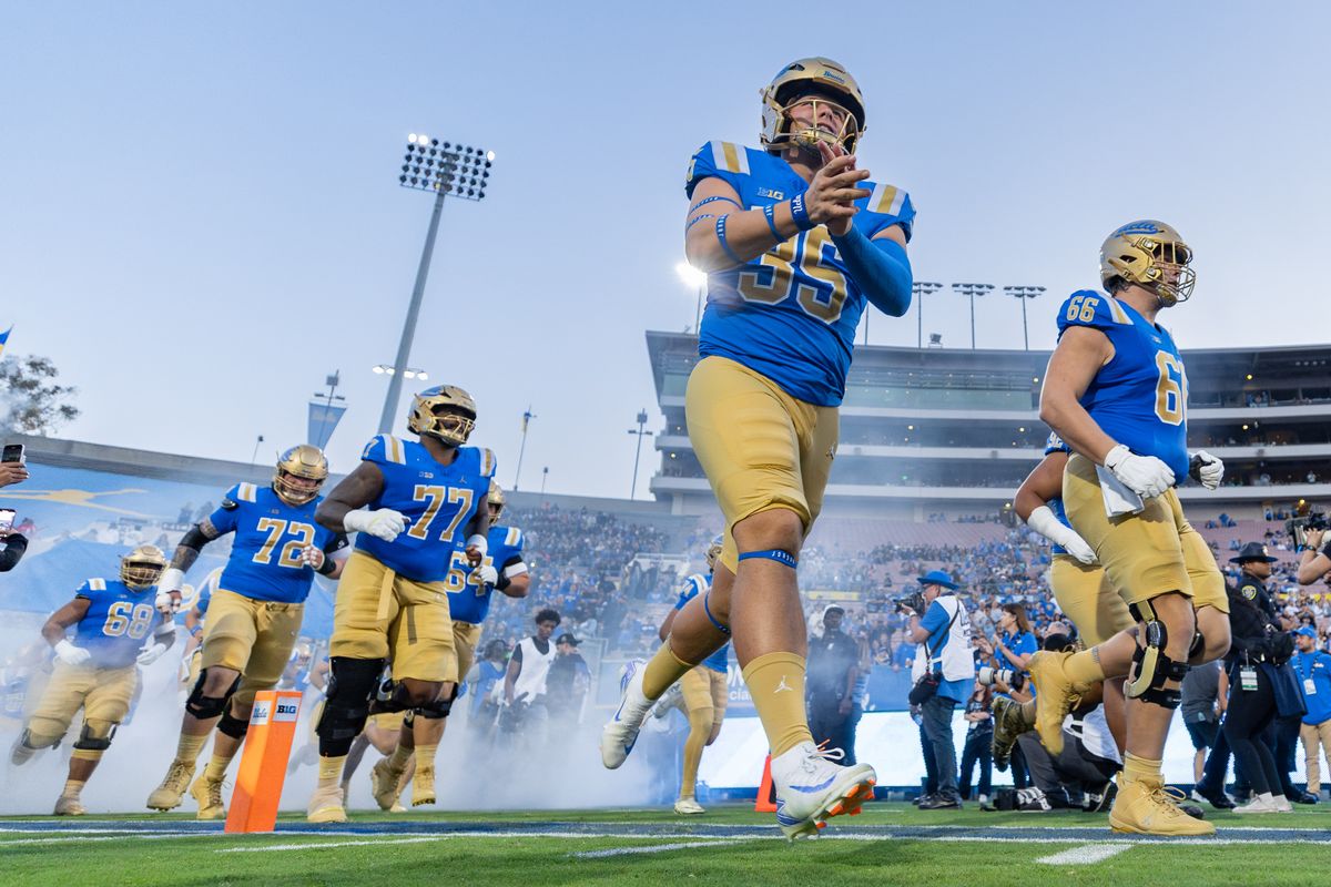 Place kicker Cash Peterman #35 of the UCLA Bruins and teammates run on the field before an NCAA football game against the New Mexico Lobos at the Rose Bowl on September 12, 2025 in Pasadena, California. Place kicker Cash Peterman #35 of the UCLA Bruins and teammates run on the field before an NCAA football game against the New Mexico Lobos at the Rose Bowl on September 12, 2025 in Pasadena, California.