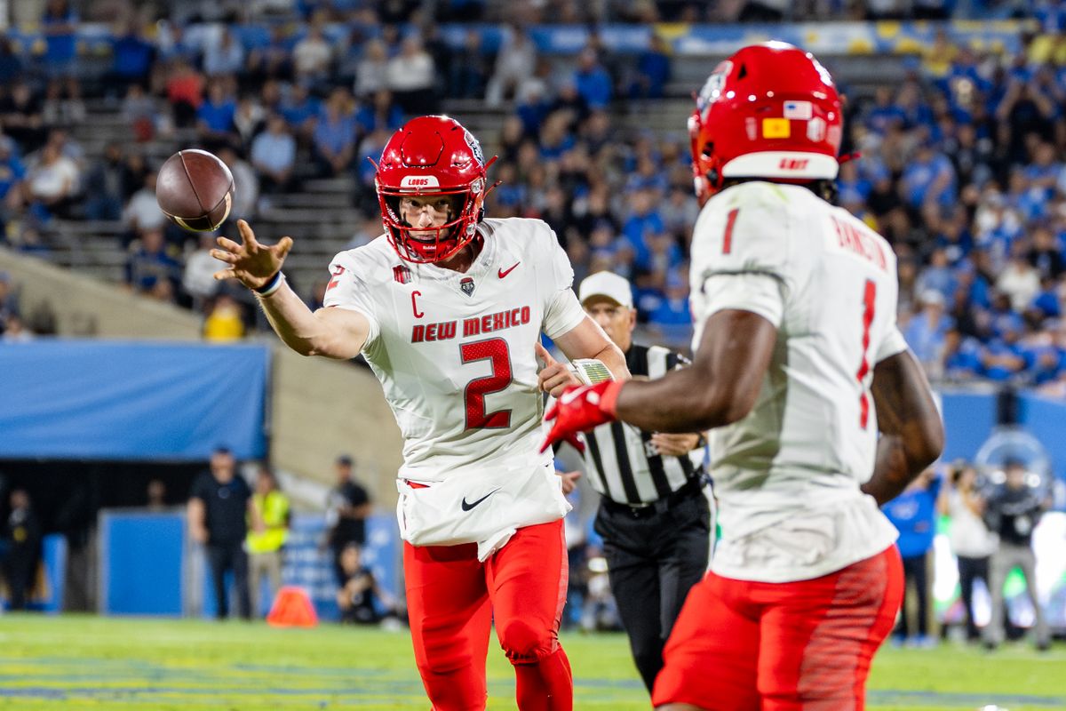 Quarterback Jack Layne #2 of the New Mexico Lobos attempts a pass during an NCAA football game against the UCLA Bruins at the Rose Bowl on September 12, 2025 in Pasadena, California. Quarterback Jack Layne #2 of the New Mexico Lobos attempts a pass during an NCAA football game against the UCLA Bruins at the Rose Bowl on September 12, 2025 in Pasadena, California.