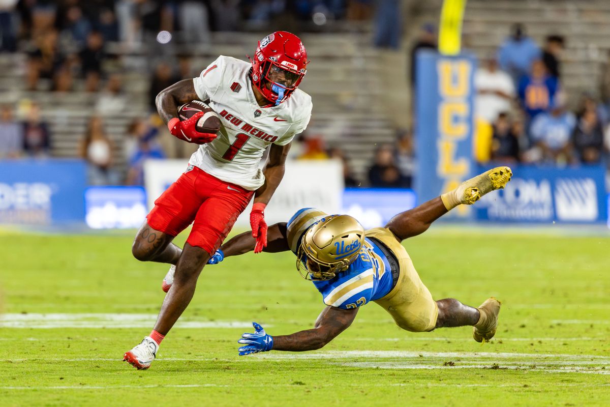 Running back Damon Bankston #1 of the New Mexico Lobos evades a tackle during an NCAA football game against the UCLA Bruins at the Rose Bowl on September 12, 2025 in Pasadena, California. Running back Damon Bankston #1 of the New Mexico Lobos evades a tackle during an NCAA football game against the UCLA Bruins at the Rose Bowl on September 12, 2025 in Pasadena, California.