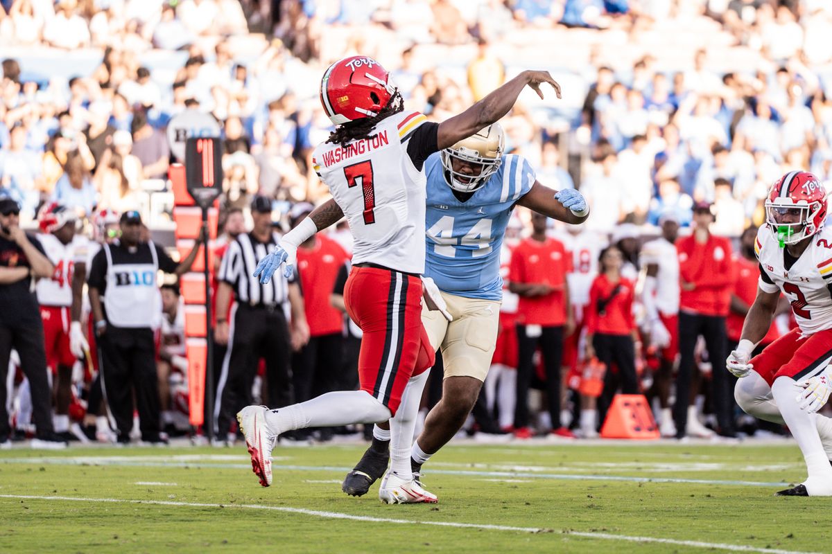 #44 Devin Aupiu of UCLA tries to tackle the QB during an NCAA football game against Maryland Terrapinson October 18, 2025 in Pasadena, CA.