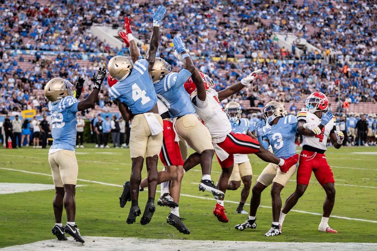 UCLA defense deflects a Hail Mary during an NCAA football game against Maryland Terrapinson October 18, 2025 in Pasadena, CA.