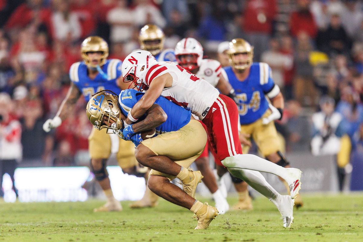 UCLA Bruins wide receiver Rico Flores Jr. (1) gets jumped on during the game against Nebraska Cornhuskers at Rose Bowl Stadium on November 8, 2025 in Pasadena, California. 