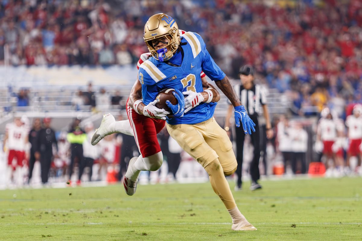 UCLA Bruins wide receiver Kwazi Gilmer (3) runs the ball during the game against Nebraska Cornhuskers at Rose Bowl Stadium on November 8, 2025 in Pasadena, California. 