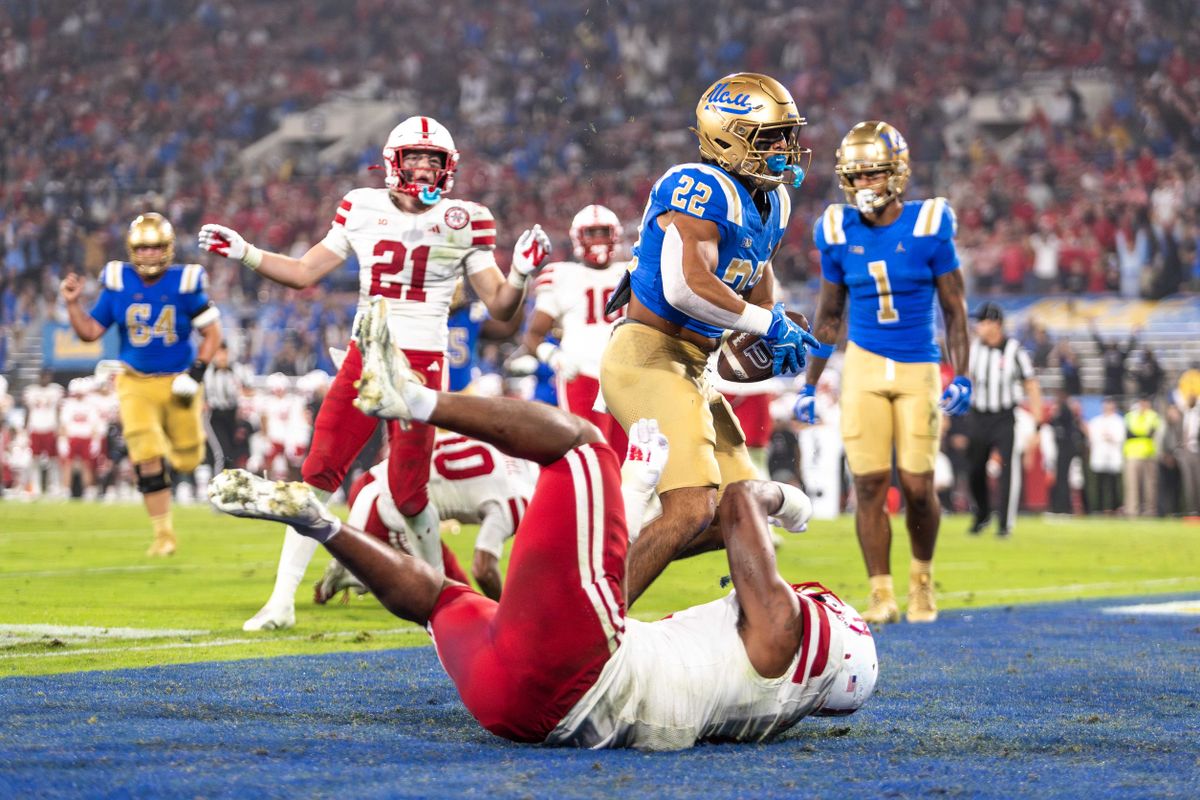 UCLA Bruins running back Anthony Frias II (22) runs in for a touchdown during the game against Nebraska Cornhuskers at Rose Bowl Stadium on November 8, 2025 in Pasadena, California. 