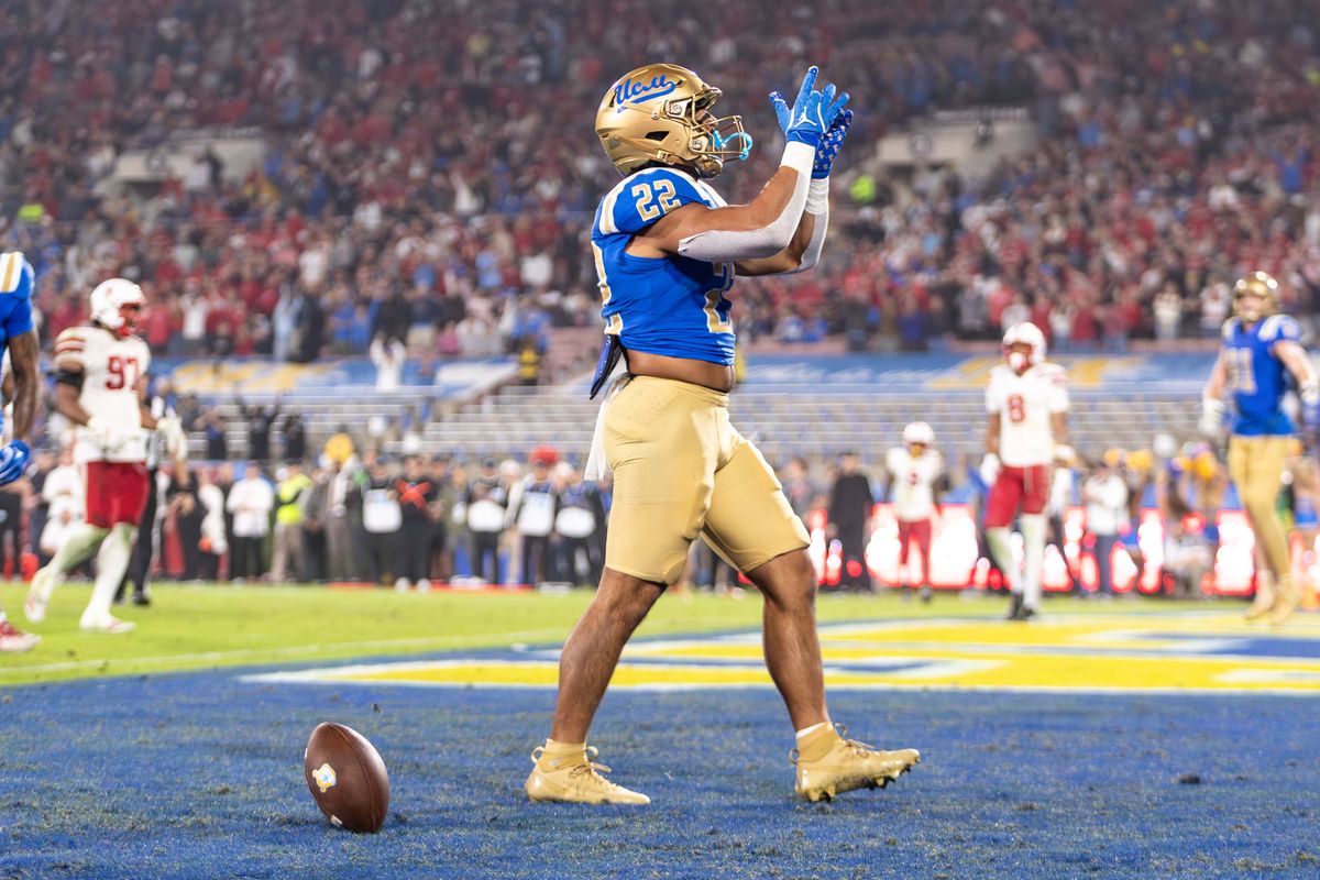 UCLA Bruins running back Anthony Frias II (22) celebrates a touchdown during the game against Nebraska Cornhuskers at Rose Bowl Stadium on November 8, 2025 in Pasadena, California. 
