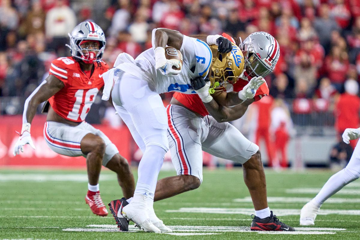 Ohio State Buckeyes linebacker Arvell Reese #8 tackles UCLA Bruins running back Anthony Woods #6 in the first half against the UCLA Bruins during a college football game at Ohio Stadium on November 15, 2025 in Columbus, Ohio. Ohio State Buckeyes linebacker Arvell Reese #8 tackles UCLA Bruins running back Anthony Woods #6 in the first half against the UCLA Bruins during a college football game at Ohio Stadium on November 15, 2025 in Columbus, Ohio.