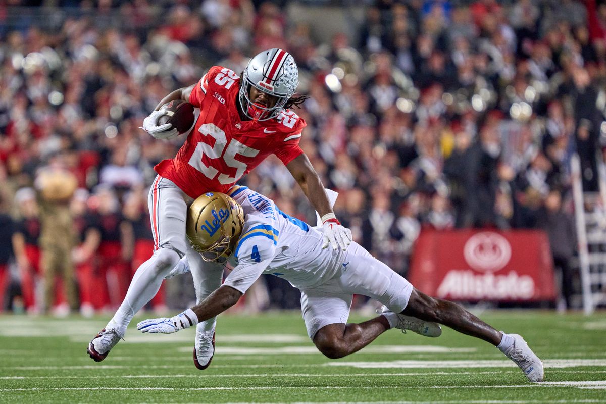 Ohio State Buckeyes running back Bo Jackson #25 battles with UCLA Bruins defensive back Key Lawrence #4 in the second half against the UCLA Bruins during a college football game at Ohio Stadium on November 15, 2025 in Columbus, Ohio. Ohio State Buckeyes running back Bo Jackson #25 battles with UCLA Bruins defensive back Key Lawrence #4 in the second half against the UCLA Bruins during a college football game at Ohio Stadium on November 15, 2025 in Columbus, Ohio.