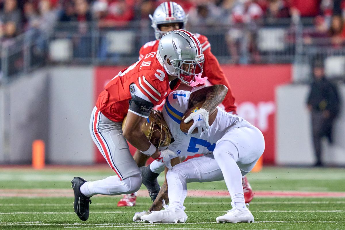 Ohio State Buckeyes cornerback Lorenzo Styles Jr. #3 tackles UCLA Bruins wide receiver Mikey Matthews #7 in the second half against the UCLA Bruins during a college football game at Ohio Stadium on November 15, 2025 in Columbus, Ohio. Ohio State Buckeyes cornerback Lorenzo Styles Jr. #3 tackles UCLA Bruins wide receiver Mikey Matthews #7 in the second half against the UCLA Bruins during a college football game at Ohio Stadium on November 15, 2025 in Columbus, Ohio.