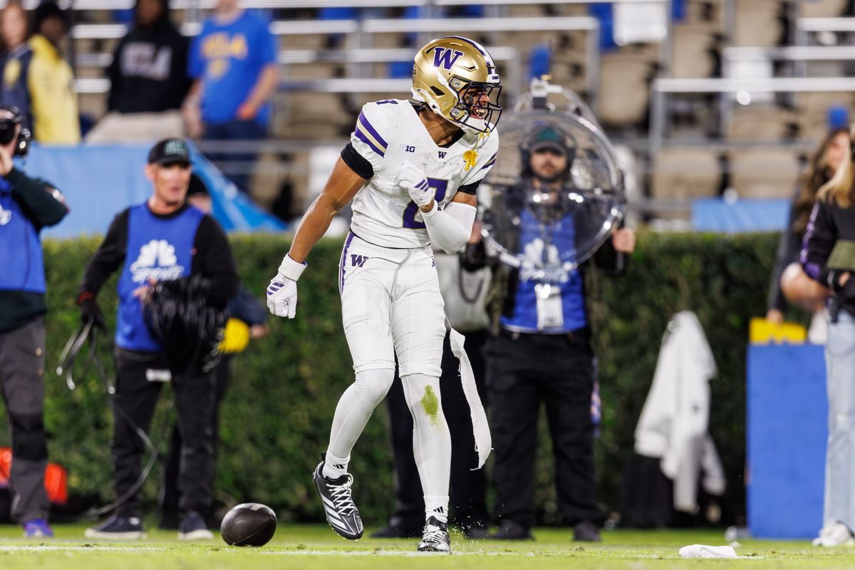 Washington Huskies wide receiver Chris Lawson (8) celebrates touchdown during the game against UCLA Bruins at Rose Bowl Stadium on November 22, 2025 in Pasadena, California. 