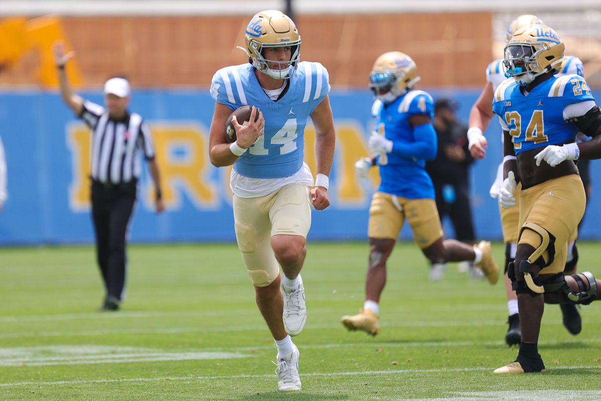 Ty Dieffenbach #14 runs with the ball during the UCLA Football Spring Showcase at Rose Bowl Stadium on May 2, 2026 in Pasadena, California.