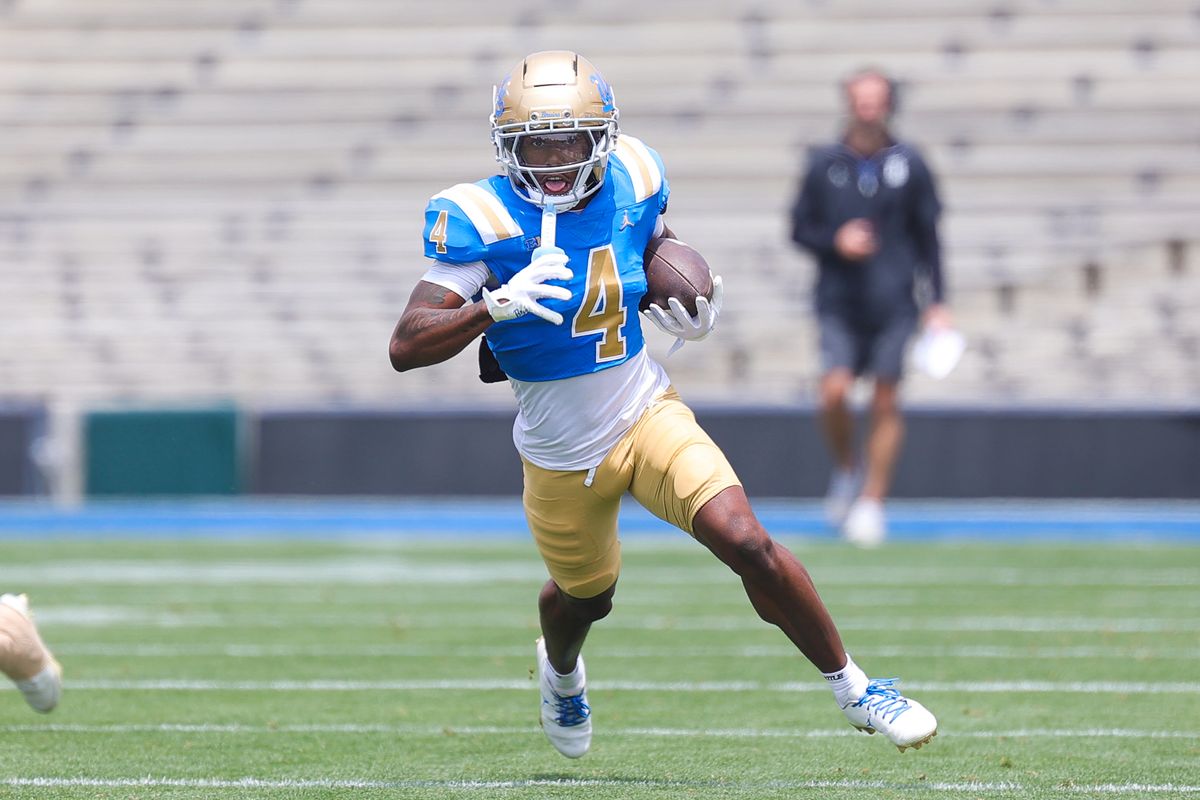 Semaj Morgan #4 runs with the ball during the UCLA Football Spring Showcase at Rose Bowl Stadium on May 2, 2026 in Pasadena, California.