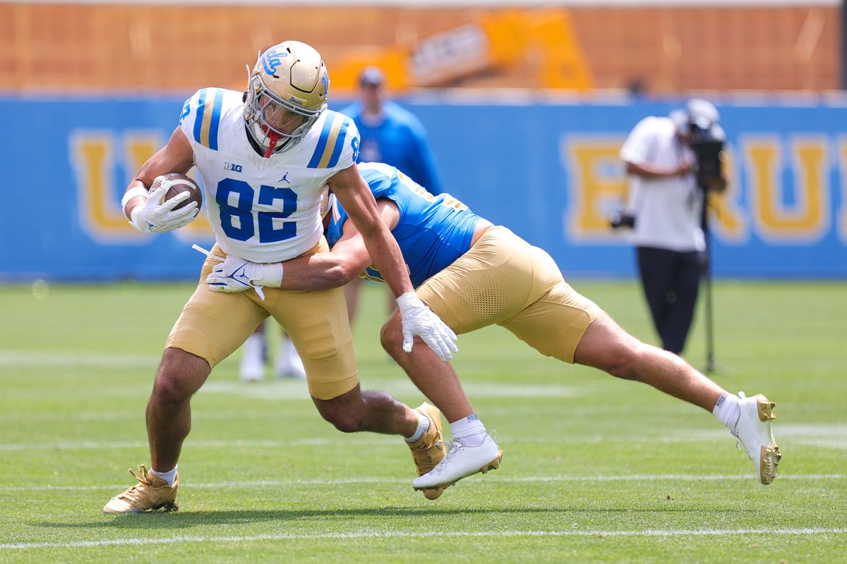 Noah Fox-Flores #82 runs with the ball during the UCLA Football Spring Showcase at Rose Bowl Stadium on May 2, 2026 in Pasadena, California.