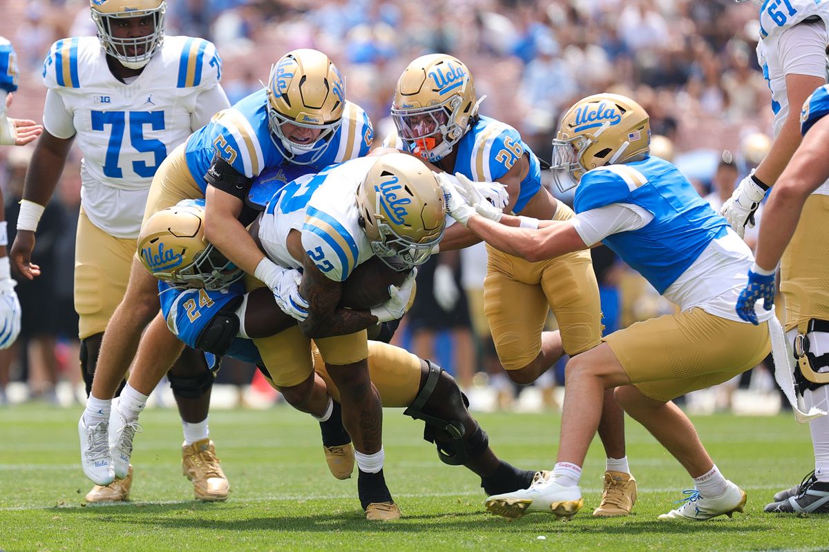 Dylan Lee #22 carries the football during the UCLA Football Spring Showcase at Rose Bowl Stadium on May 2, 2026 in Pasadena, California.