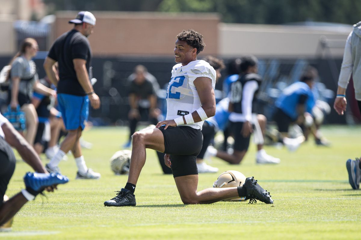 UCLA defensive back Malik Hartford stretches during practice on Friday, Aug. 7, 2026, in Los Angeles. UCLA defensive back Malik Hartford stretches during practice on Friday, Aug. 7, 2026, in Los Angeles.