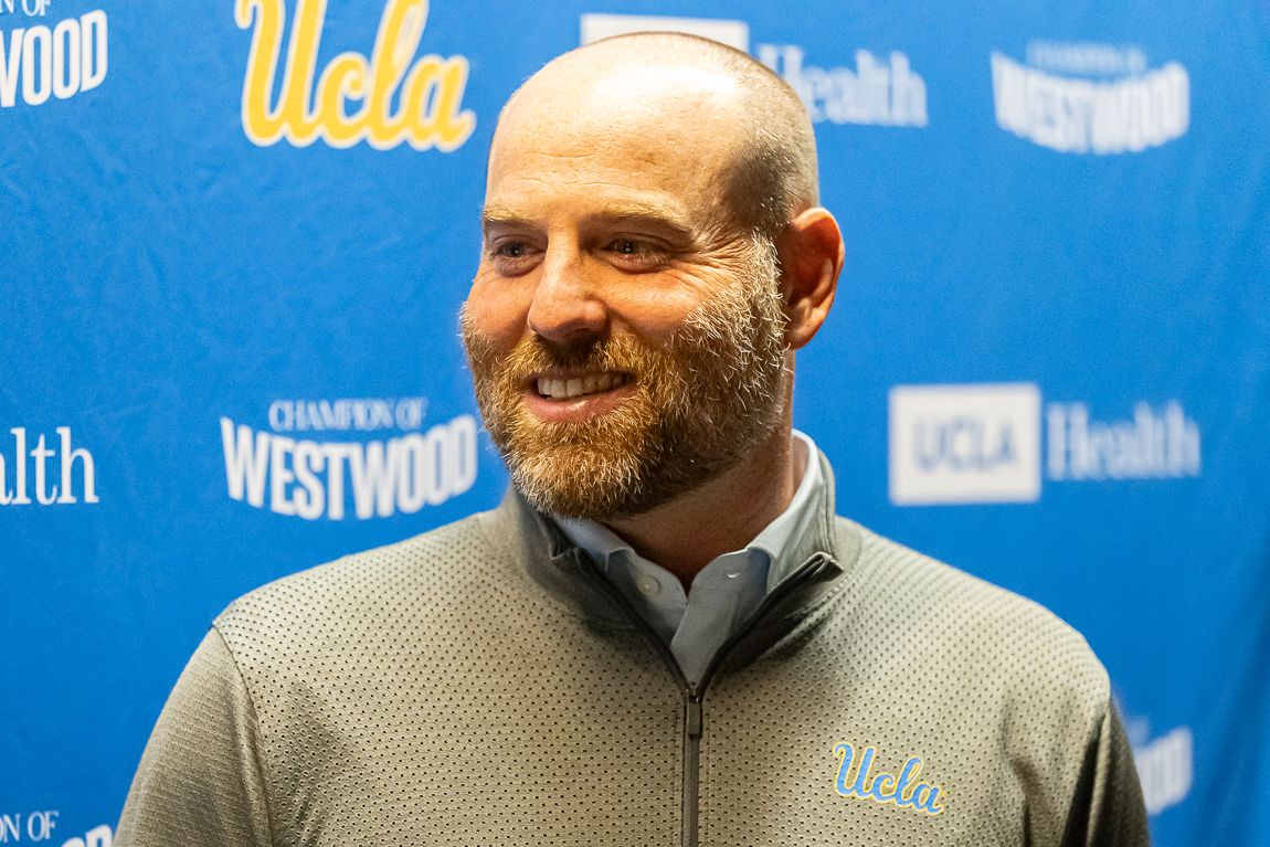 UCLA defensive coordinator Colin Hitschler during media day at Pavilion Club in Pauley Pavilion, Los Angeles. UCLA defensive coordinator Colin Hitschler during media day at Pavilion Club in Pauley Pavilion, Los Angeles.