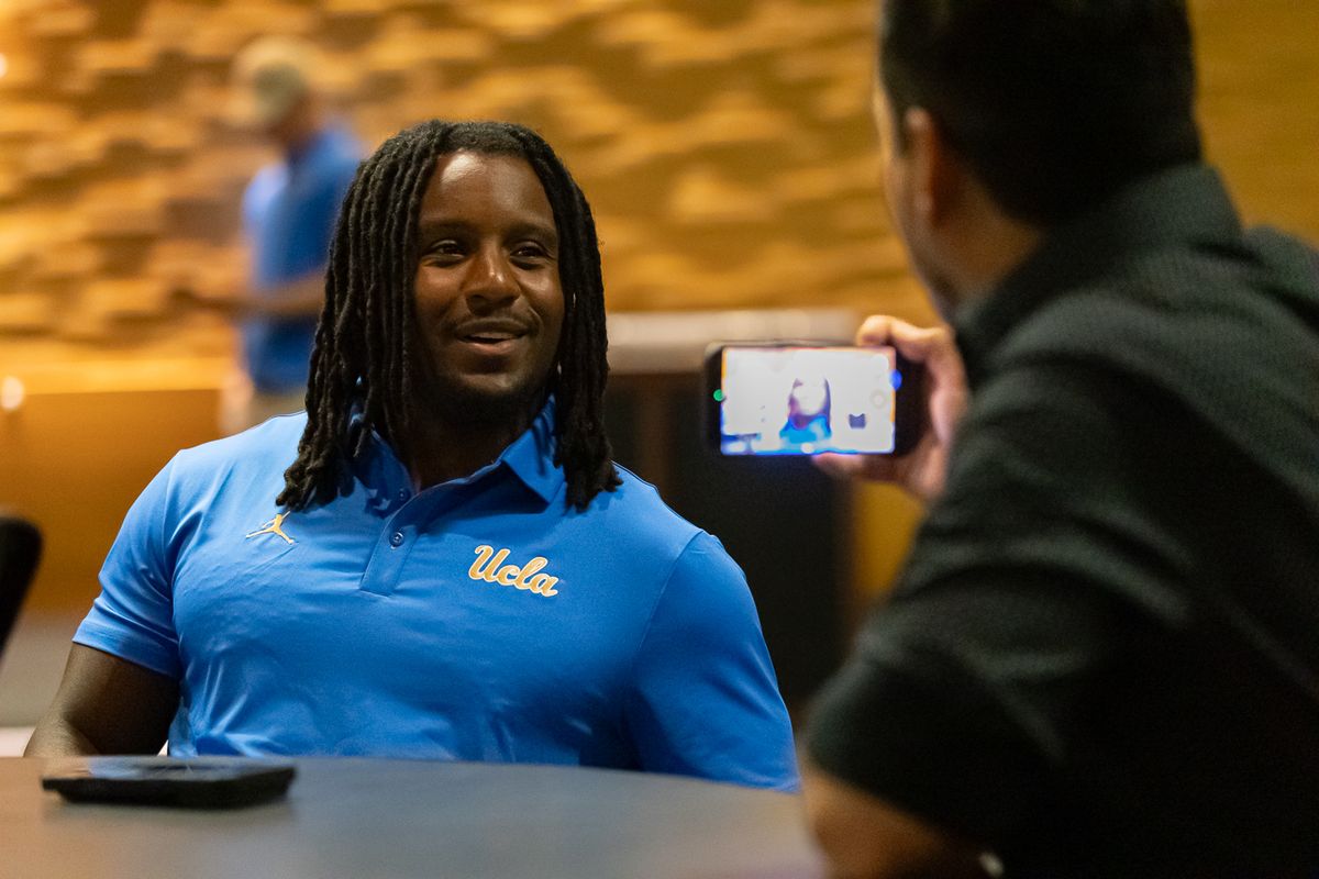 UCLA running back Wayne Knight sits down with media members during media day at Pavilion Club in Pauley Pavilion, Los Angeles. UCLA running back Wayne Knight sits down with media members during media day at Pavilion Club in Pauley Pavilion, Los Angeles.