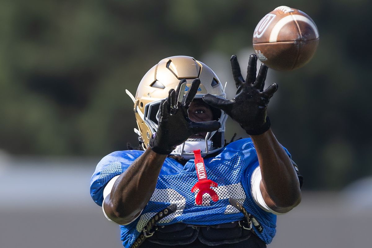 UCLA defensive back Ta'Shawn James (27) catches a pass during practice at Wasserman Football Center, Tuesday, Aug. 25, 2026, in Los Angeles. UCLA defensive back Ta'Shawn James (27) catches a pass during practice at Wasserman Football Center, Tuesday, Aug. 25, 2026, in Los Angeles.