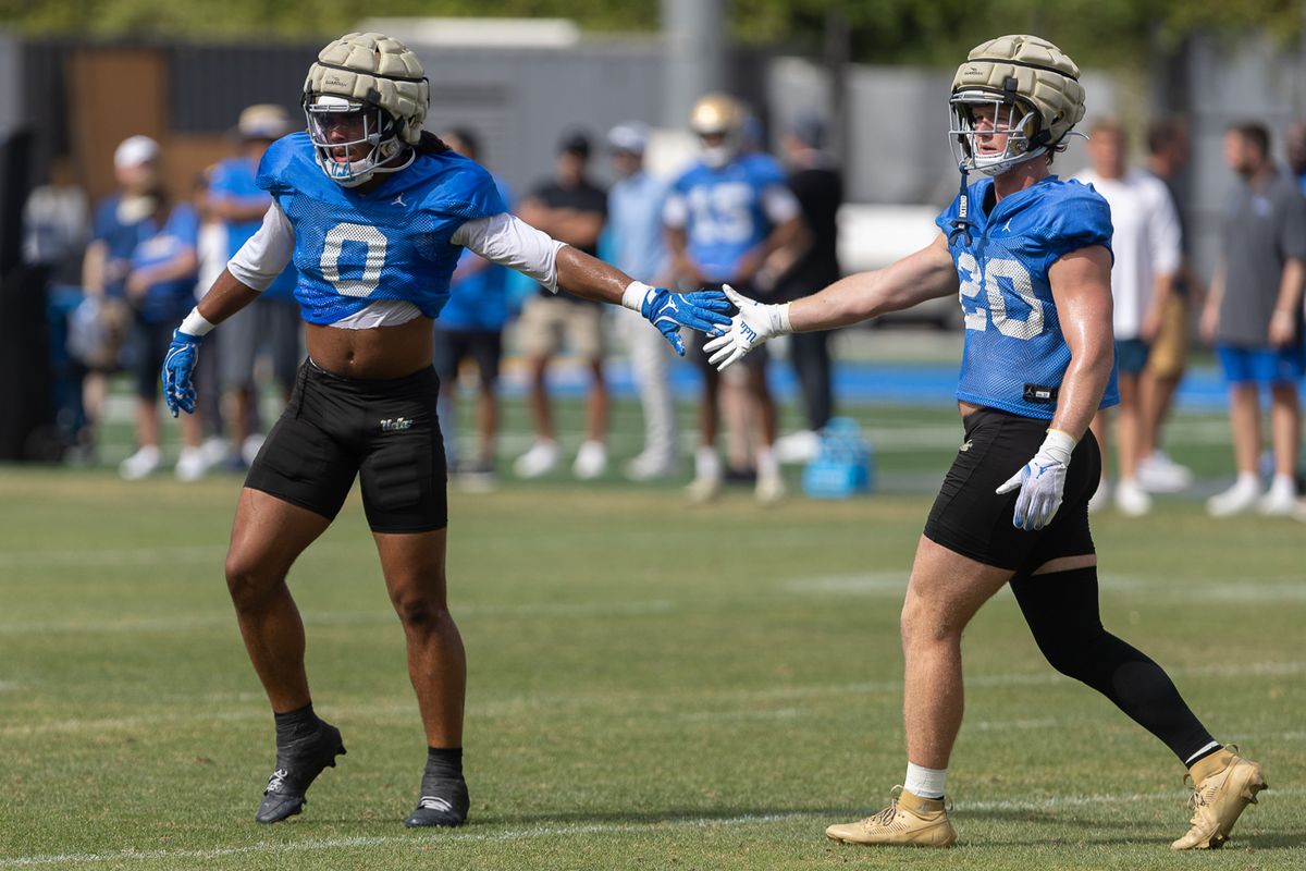 UCLA players celebrate during practice at Wasserman Football Center, Thursday, Aug. 27, 2026, in Los Angeles.
