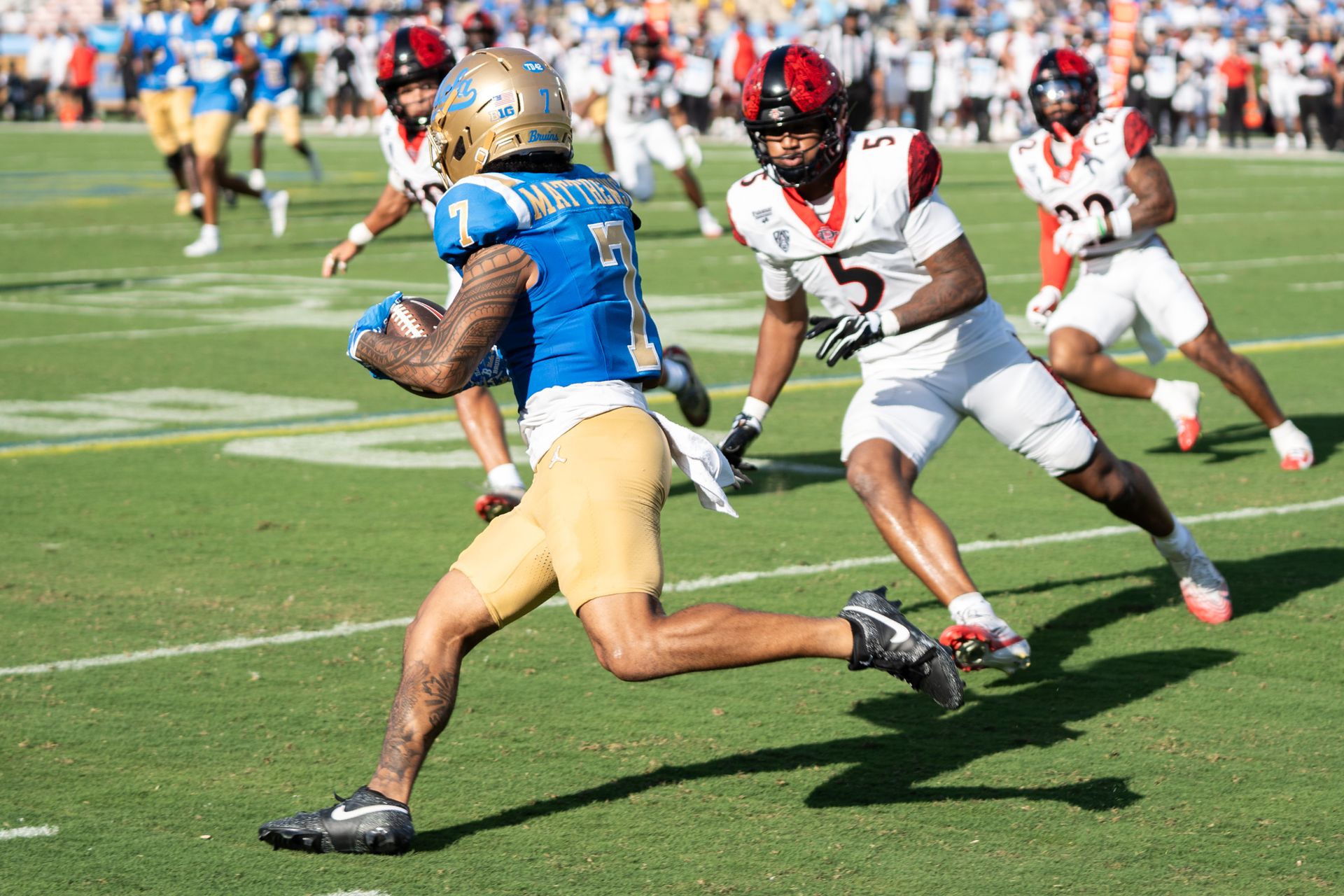 UCLA Bruins Punt Returner Mikey Matthews (7) returns a punt during a game against San Diego State Aztecs at Rose Bowl Stadium on September 12, 2026 in Pasadena, California. UCLA Bruins Punt Returner Mikey Matthews (7) returns a punt during a game against San Diego State Aztecs at Rose Bowl Stadium on September 12, 2026 in Pasadena, California.