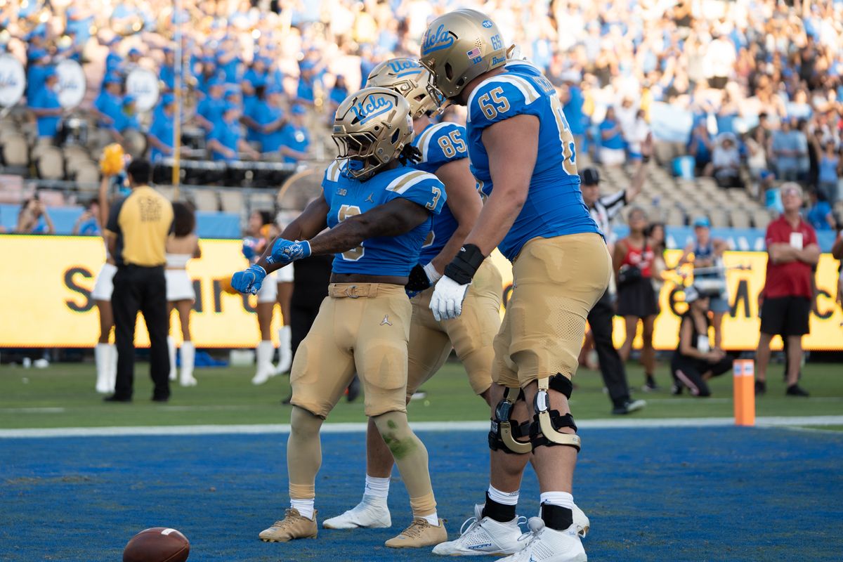 UCLA Bruins RB Wayne Knight (3) celebrates after scoring a rushing touchdown during a game against San Diego State Aztecs at Rose Bowl Stadium on September 12, 2026 in Pasadena, California. 