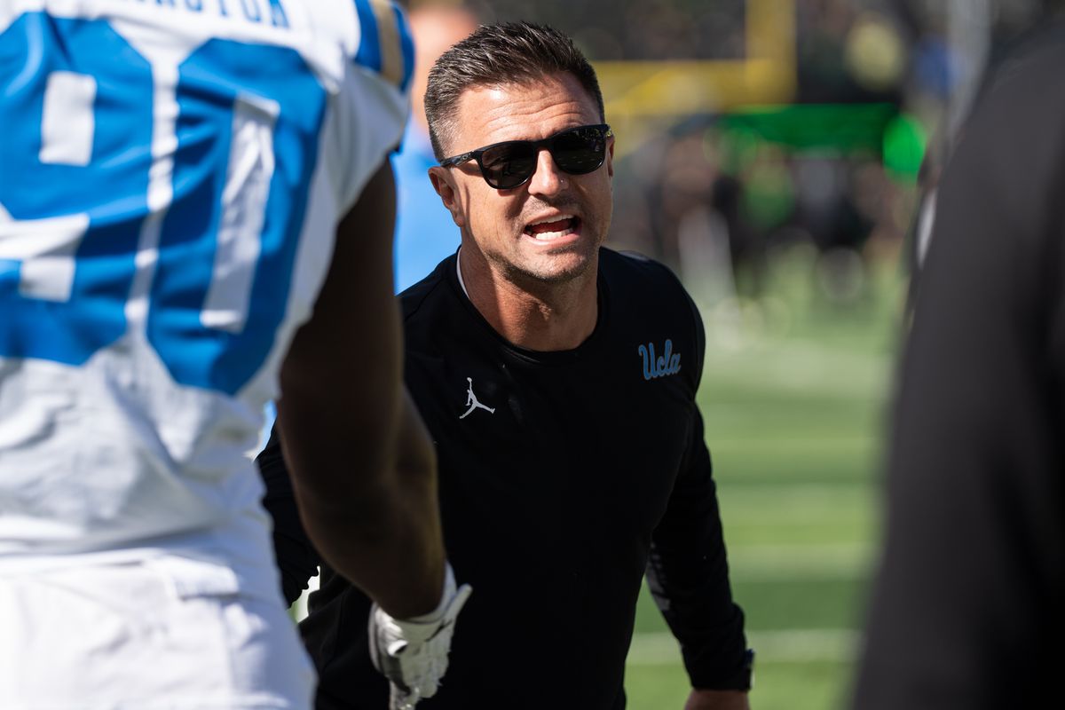 UCLA Bruins Head Coach Bob Chesney hypes up his players during a game against the Oregon Ducks at Rose Bowl Stadium on October 10, 2026 in Eugene, Oregon. UCLA Bruins Head Coach Bob Chesney hypes up his players during a game against the Oregon Ducks at Rose Bowl Stadium on October 10, 2026 in Eugene, Oregon.