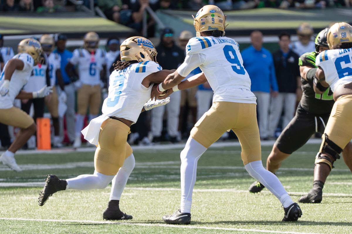 UCLA Bruins QB Nico Iamaleava (9) hands the ball off to his running back during a game against the Oregon Ducks at Autzen Stadium on October 10, 2026 in Eugene, Oregon. UCLA Bruins QB Nico Iamaleava (9) hands the ball off to his running back during a game against the Oregon Ducks at Autzen Stadium on October 10, 2026 in Eugene, Oregon.