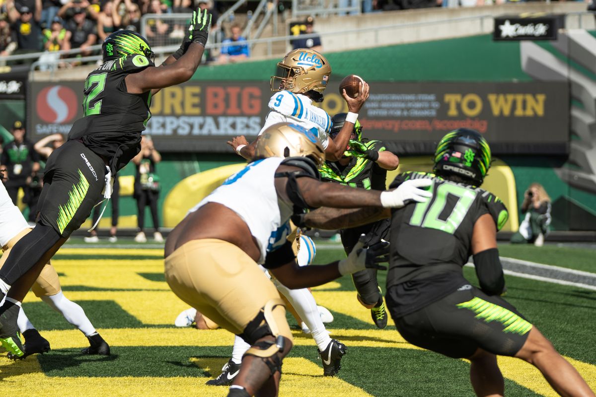 UCLA Bruins QB Nico Lamaleava (9) gets the ball out before getting sacked during a game against the Oregon Ducks at Autzen Stadium on October 10, 2026 in Eugene, Oregon. UCLA Bruins QB Nico Lamaleava (9) gets the ball out before getting sacked during a game against the Oregon Ducks at Autzen Stadium on October 10, 2026 in Eugene, Oregon.