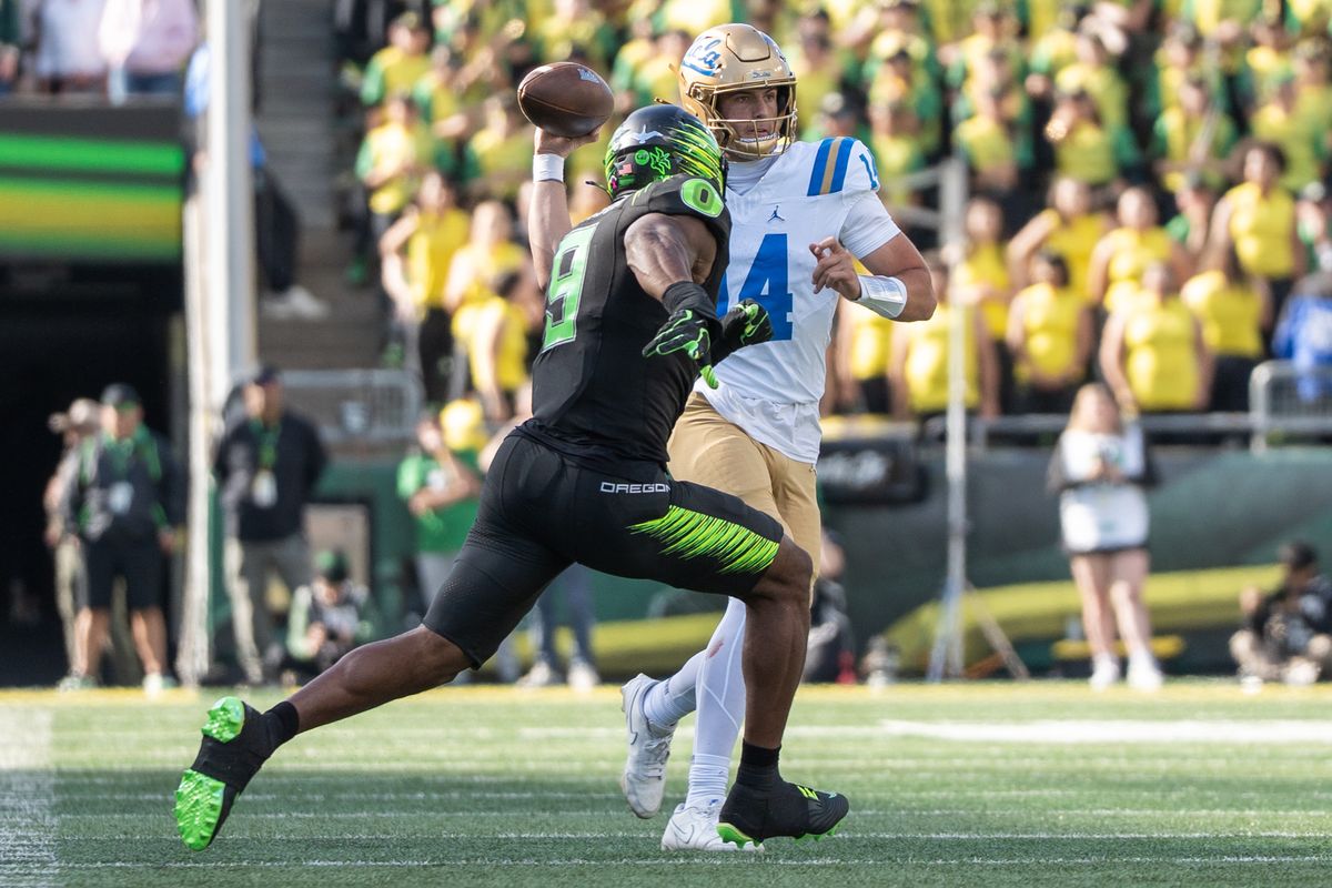 UCLA Bruins QB Ty Dieffenbach (14) gets rid of the ball before getting sacked during a game against the Oregon Ducks at Autzen Stadium on October 10, 2026 in Eugene, Oregon. UCLA Bruins QB Ty Dieffenbach (14) gets rid of the ball before getting sacked during a game against the Oregon Ducks at Autzen Stadium on October 10, 2026 in Eugene, Oregon.