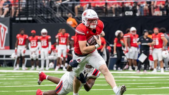 UNLV quarterback Matthew Sluka (3) strides for a first down while dodging tackles during college football game against Utah Tech on Saturday Sept. 7, 2024 in Las Vegas. (Kalin Sipes - The Sporting Tribune) UNLV quarterback Matthew Sluka (3) strides for a first down while dodging tackles during college football game against Utah Tech on Saturday Sept. 7, 2024 in Las Vegas. (Kalin Sipes - The Sporting Tribune)